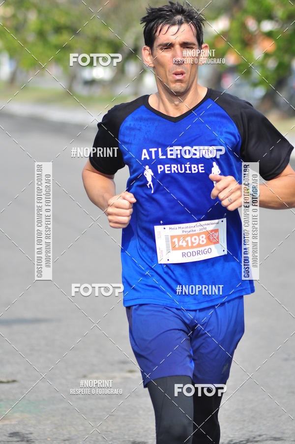 Buy your photos of the eventMeia Maratona Internacional de Peru�be on Fotop