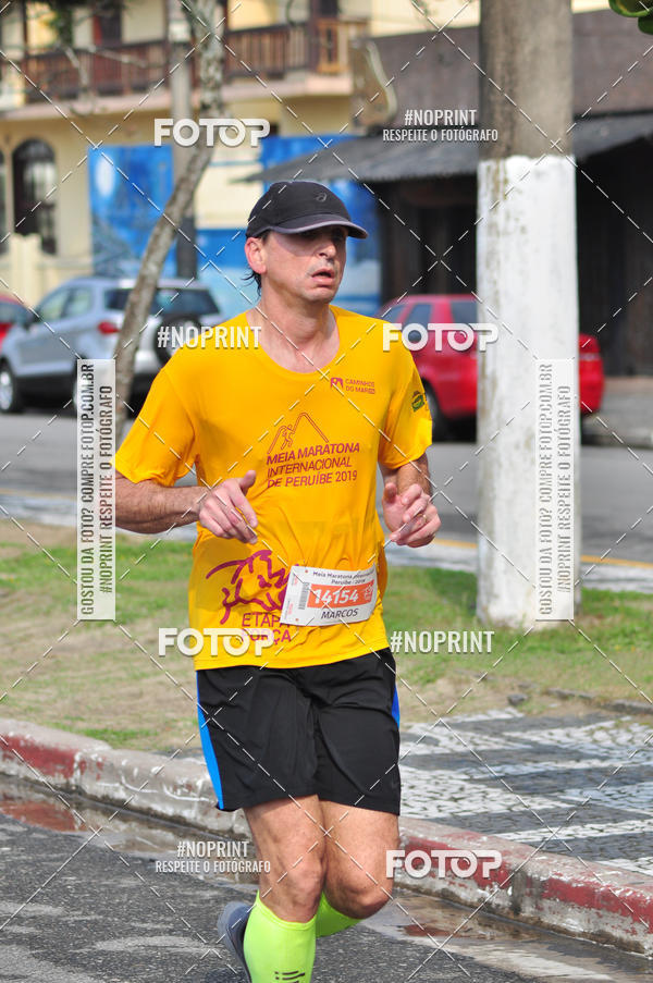 Buy your photos of the eventMeia Maratona Internacional de Peru�be on Fotop