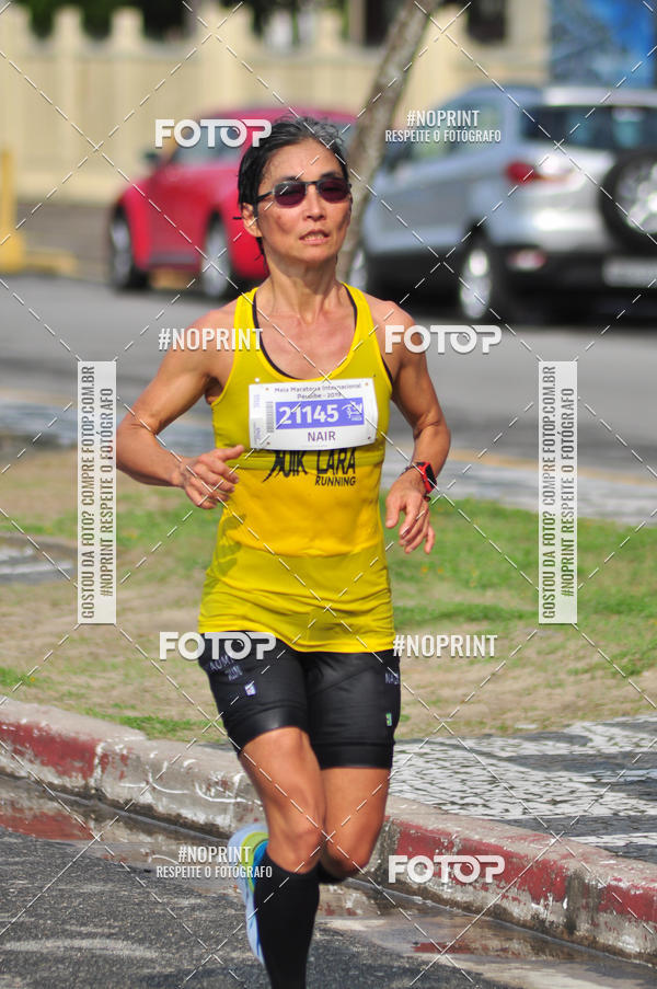 Buy your photos of the eventMeia Maratona Internacional de Peru�be on Fotop