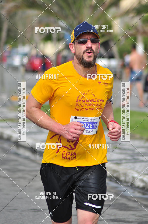 Compre suas fotos do eventoMeia Maratona Internacional de Peru�be no Fotop
