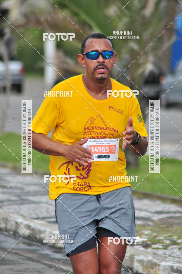 Buy your photos of the eventMeia Maratona Internacional de Peru�be on Fotop