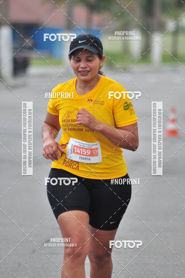 Buy your photos of the eventMeia Maratona Internacional de Peru�be on Fotop