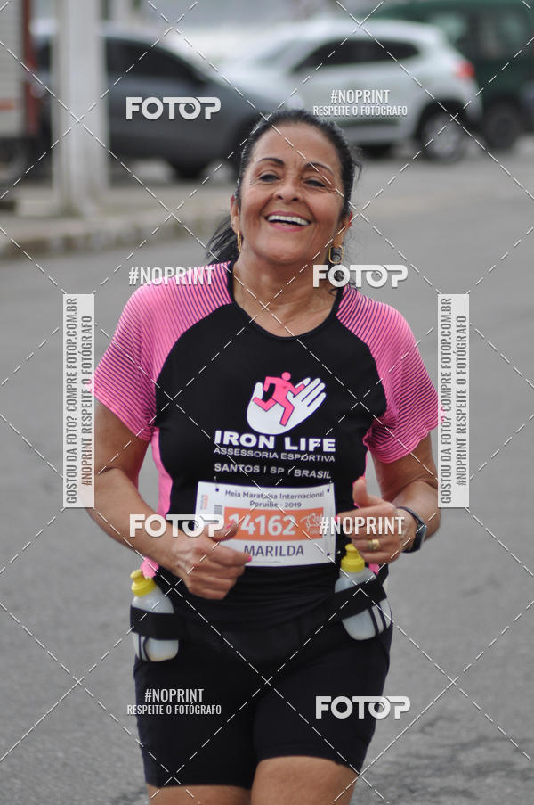 Buy your photos of the eventMeia Maratona Internacional de Peru�be on Fotop
