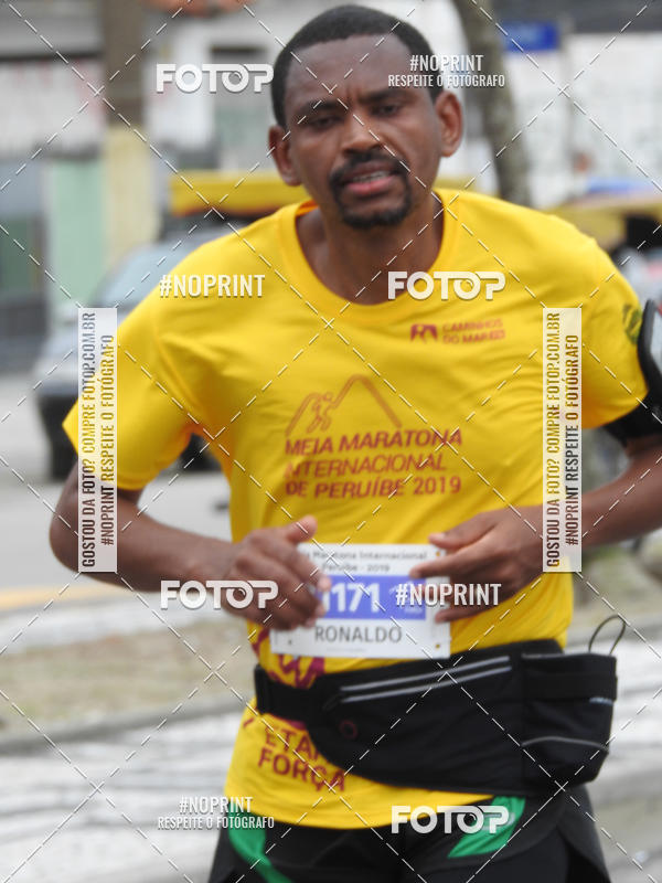 Buy your photos of the eventMeia Maratona Internacional de Peru�be on Fotop