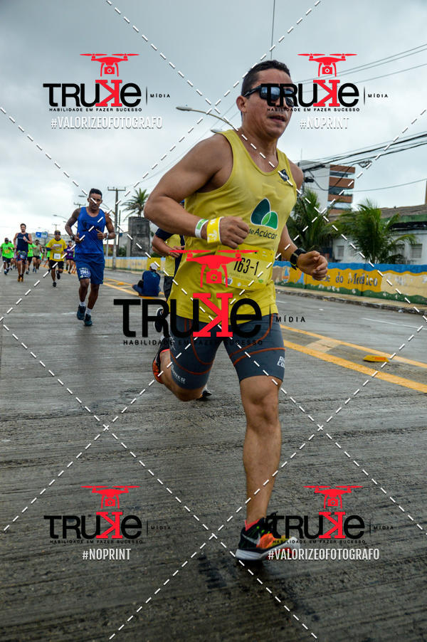 Compre suas fotos do evento18 Maratona Po de Acar de Revezamento no Fotop
