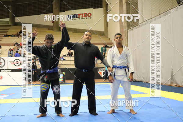 Buy your photos of the eventfight friends on Fotop