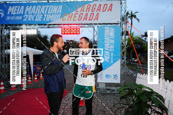 Buy your photos of the event1 Meia Maratona Timb on Fotop