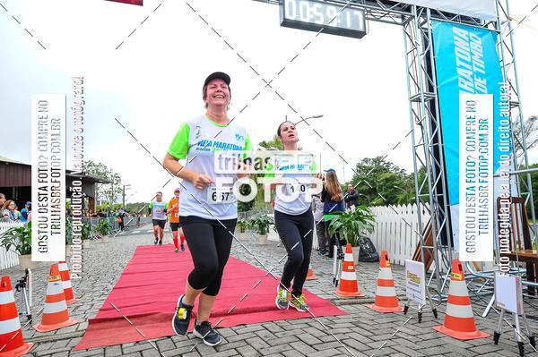 Buy your photos of the event1 Meia Maratona Timb on Fotop