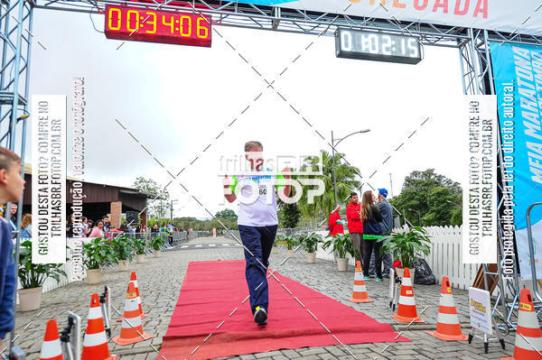 Buy your photos of the event1 Meia Maratona Timb on Fotop
