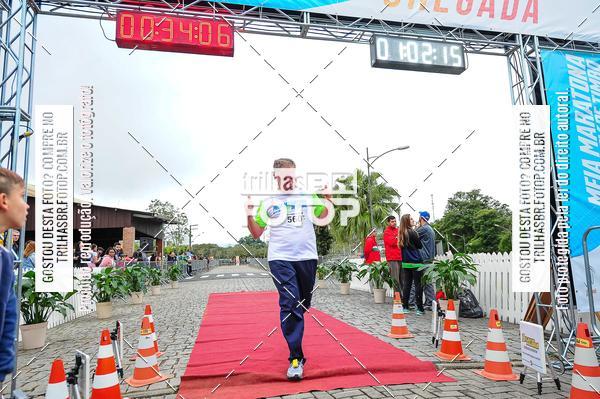 Buy your photos of the event1 Meia Maratona Timb on Fotop