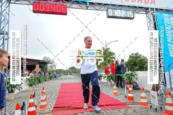 Buy your photos of the event1 Meia Maratona Timb on Fotop