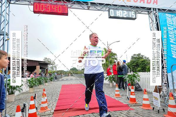 Buy your photos of the event1 Meia Maratona Timb on Fotop