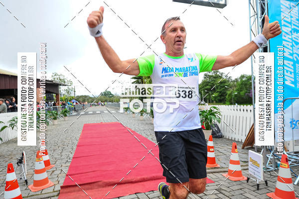 Buy your photos of the event1 Meia Maratona Timb on Fotop