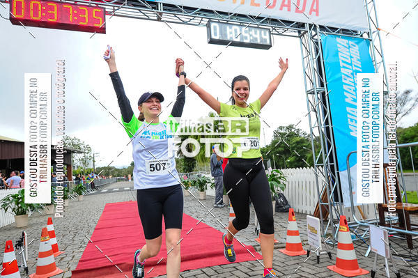 Buy your photos of the event1 Meia Maratona Timb on Fotop