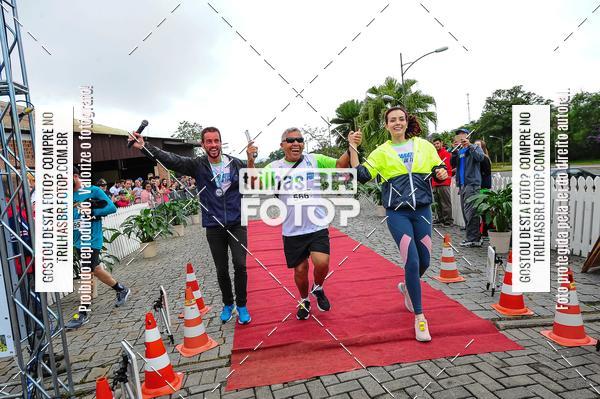 Buy your photos of the event1 Meia Maratona Timb on Fotop