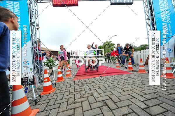 Buy your photos of the event1 Meia Maratona Timb on Fotop