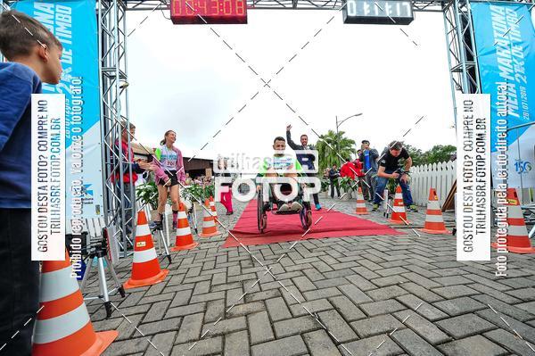 Buy your photos of the event1 Meia Maratona Timb on Fotop