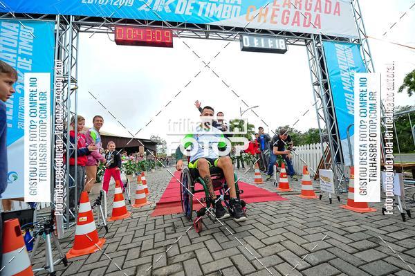 Buy your photos of the event1 Meia Maratona Timb on Fotop