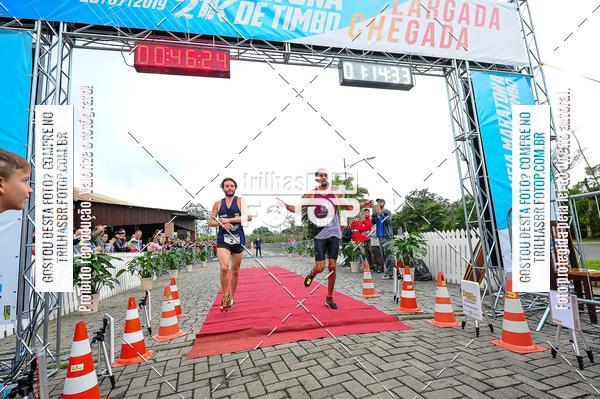 Buy your photos of the event1 Meia Maratona Timb on Fotop