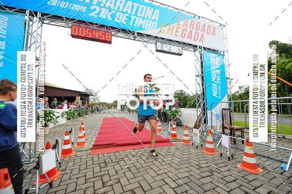 Buy your photos of the event1 Meia Maratona Timb on Fotop