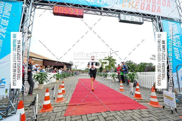 Buy your photos of the event1 Meia Maratona Timb on Fotop