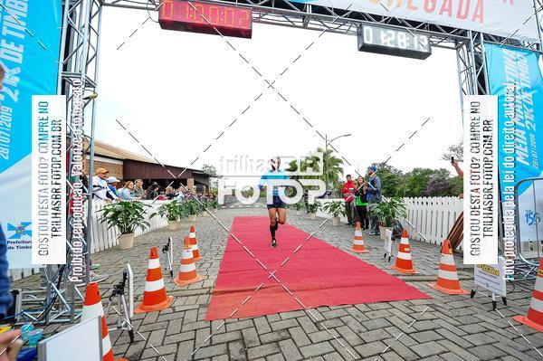 Buy your photos of the event1 Meia Maratona Timb on Fotop