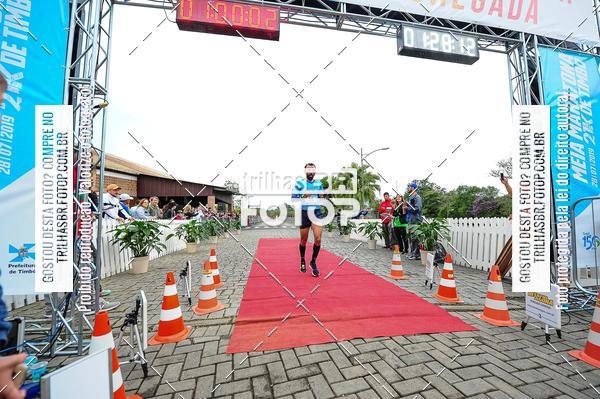 Buy your photos of the event1 Meia Maratona Timb on Fotop