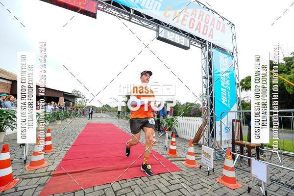 Buy your photos of the event1 Meia Maratona Timb on Fotop