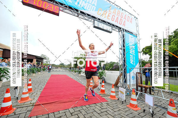 Buy your photos of the event1 Meia Maratona Timb on Fotop