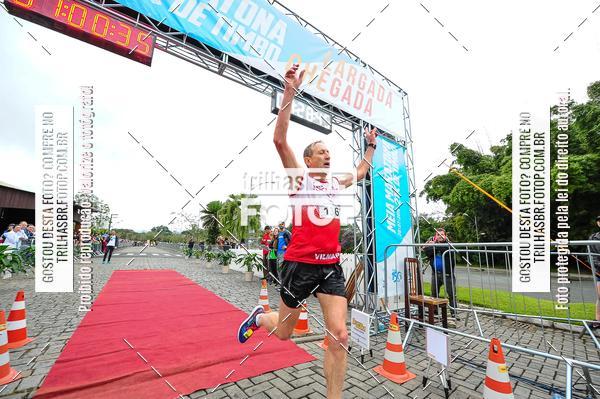 Buy your photos of the event1 Meia Maratona Timb on Fotop