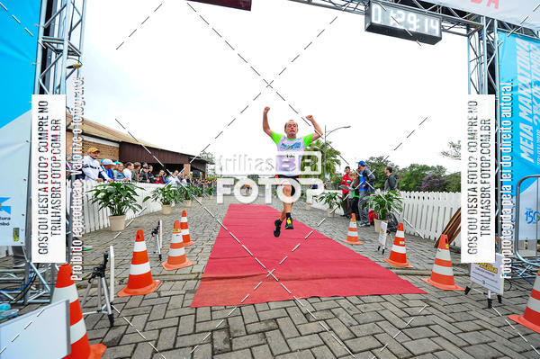 Buy your photos of the event1 Meia Maratona Timb on Fotop
