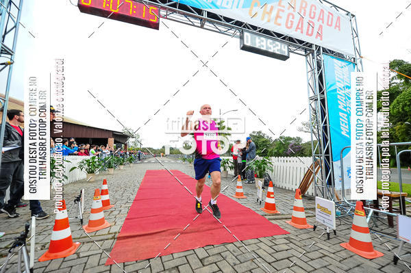 Buy your photos of the event1 Meia Maratona Timb on Fotop