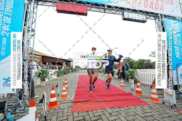 Buy your photos of the event1 Meia Maratona Timb on Fotop