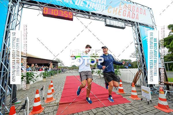 Buy your photos of the event1 Meia Maratona Timb on Fotop