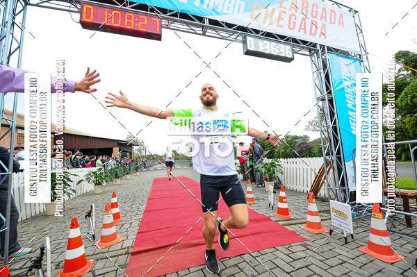 Buy your photos of the event1 Meia Maratona Timb on Fotop