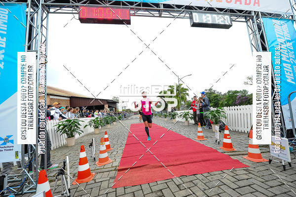 Buy your photos of the event1 Meia Maratona Timb on Fotop