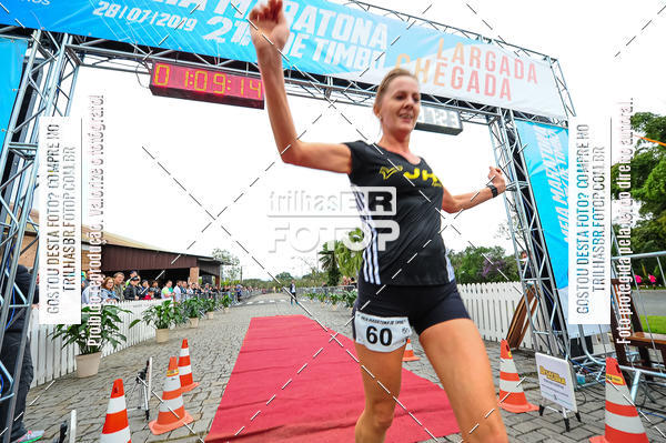 Buy your photos of the event1 Meia Maratona Timb on Fotop