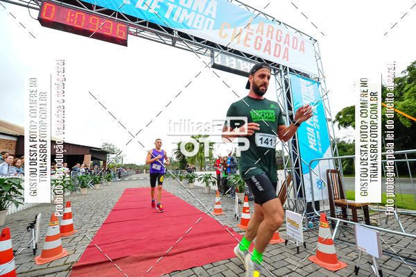 Buy your photos of the event1 Meia Maratona Timb on Fotop