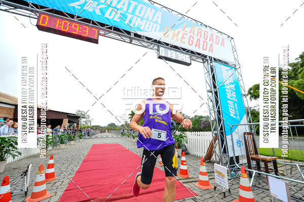Buy your photos of the event1 Meia Maratona Timb on Fotop
