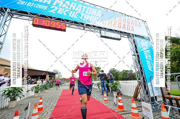 Buy your photos of the event1 Meia Maratona Timb on Fotop