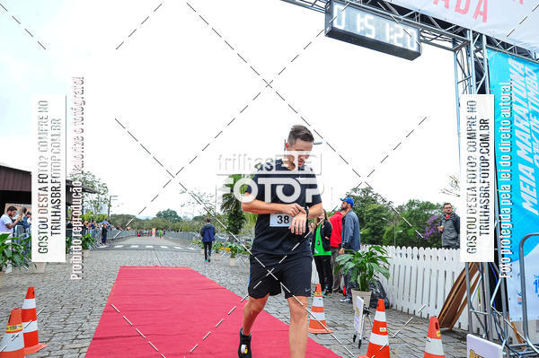 Buy your photos of the event1 Meia Maratona Timb on Fotop