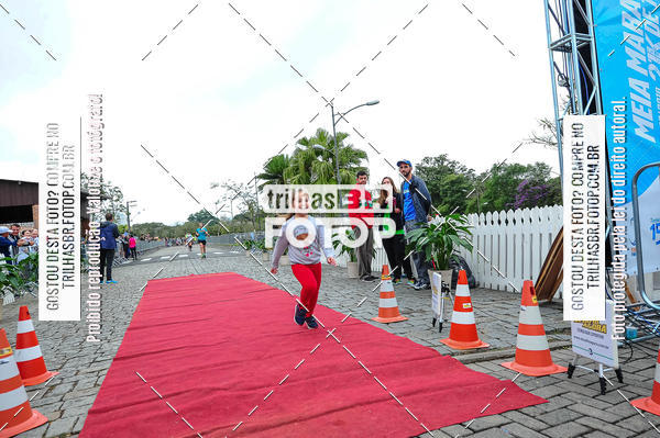 Buy your photos of the event1 Meia Maratona Timb on Fotop