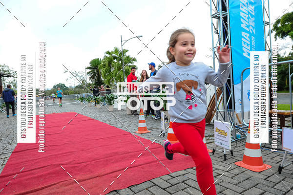 Buy your photos of the event1 Meia Maratona Timb on Fotop