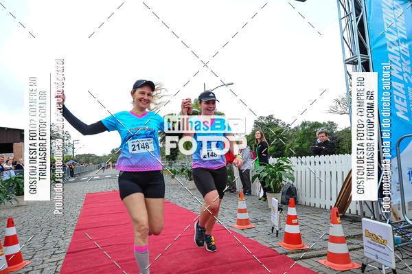 Buy your photos of the event1 Meia Maratona Timb on Fotop