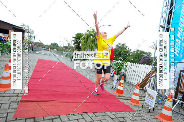 Buy your photos of the event1 Meia Maratona Timb on Fotop