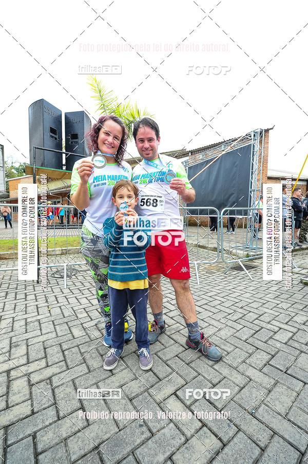 Buy your photos of the event1 Meia Maratona Timb on Fotop