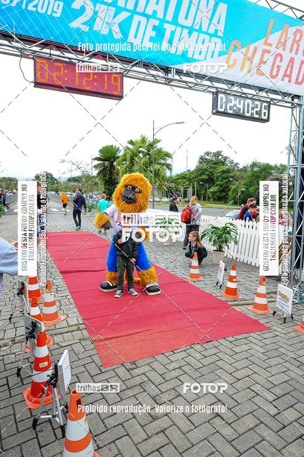 Buy your photos of the event1 Meia Maratona Timb on Fotop