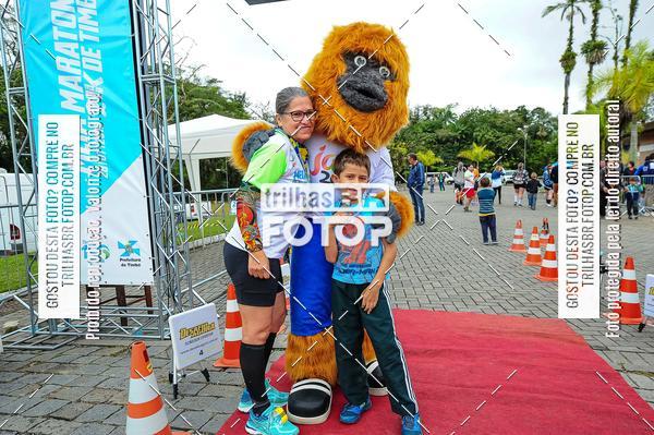 Buy your photos of the event1 Meia Maratona Timb on Fotop