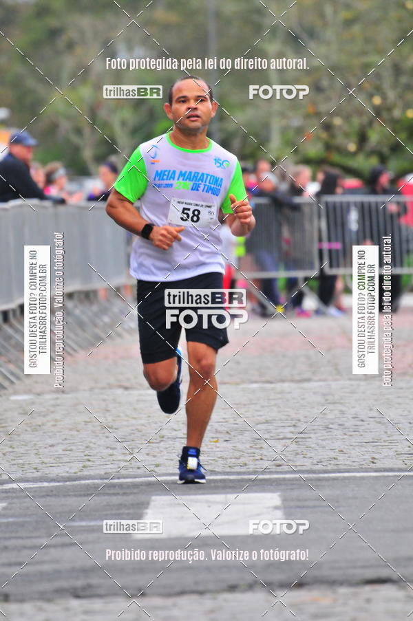 Buy your photos of the event1 Meia Maratona Timb on Fotop