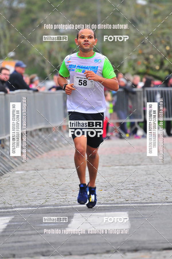 Buy your photos of the event1 Meia Maratona Timb on Fotop
